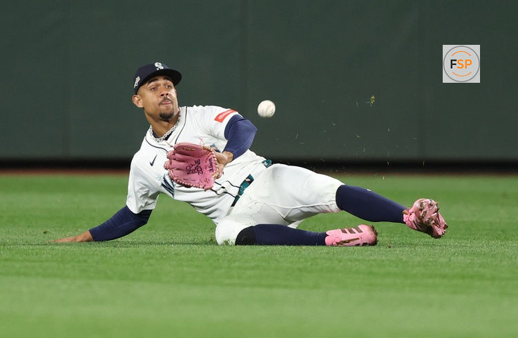 Oct 16, 2025; Seattle, Washington, USA; Seattle Mariners center fielder Julio Rodriguez (44) makes a catch in the ninth inning against the Toronto Blue Jays during game four of the ALCS round for the 2025 MLB playoffs at T-Mobile Park. Credit: Kevin Ng-Imagn Images