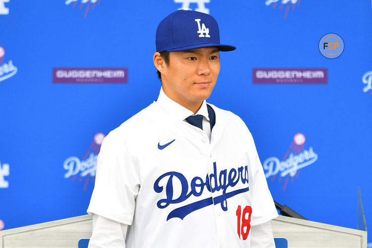 LOS ANGELES, CA - DECEMBER 27: Newly acquired Los Angeles Dodgers pitcher Yoshinobu Yamamoto is introduced at a press conference on December 27, 2023 at Dodger Stadium in Los Angeles, CA. (Photo by Brian Rothmuller/Icon Sportswire)