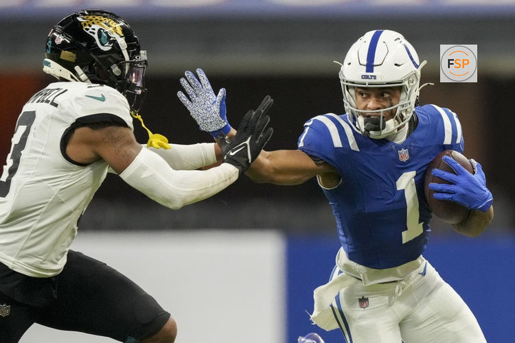Jan 5, 2025; Indianapolis, Indiana, USA; Indianapolis Colts wide receiver Josh Downs (1) reaches to push off Jacksonville Jaguars cornerback Tyson Campbell (3) during a game against the Jacksonville Jaguars at Lucas Oil Stadium at Lucas Oil Stadium. Credit: Grace Hollars/USA TODAY Network via Imagn Images