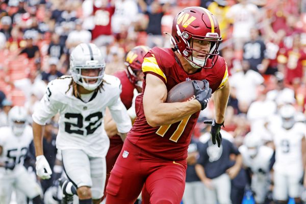 Sep 21, 2025; Landover, Maryland, USA; Washington Commanders wide receiver Luke McCaffrey (11) runs for a touchdown during the second half against the Las Vegas Raiders at Northwest Stadium. Mandatory Credit: Amber Searls-Imagn Images