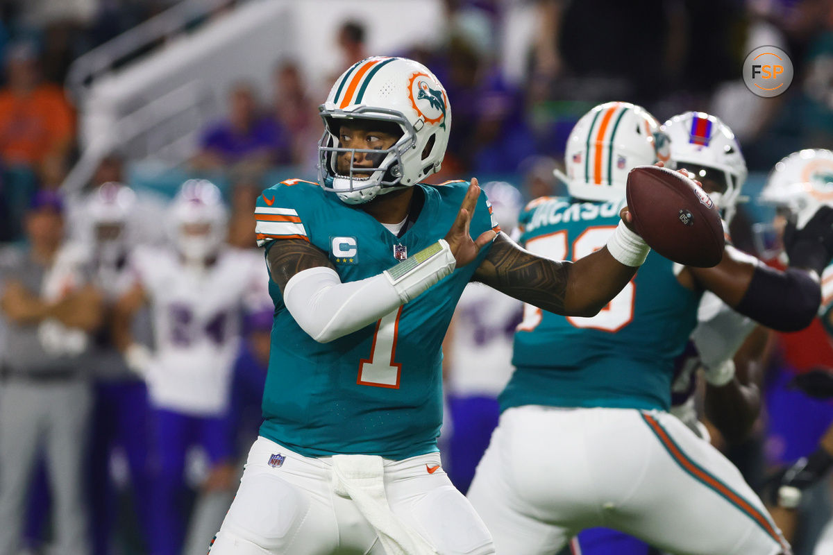 Sep 12, 2024; Miami Gardens, Florida, USA; Miami Dolphins quarterback Tua Tagovailoa (1) throws the football against the Buffalo Bills during the first quarter at Hard Rock Stadium. Credit: Sam Navarro-Imagn Images