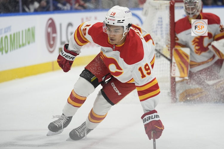 Oct 28, 2025; Toronto, Ontario, CAN; Calgary Flames defenseman Zayne Parekh (19) skates against the Toronto Maple Leafs during the first period at Scotiabank Arena. Credit: John E. Sokolowski-Imagn Images