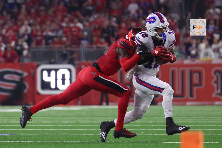 Nov 20, 2025; Houston, Texas, USA; Houston Texans cornerback Kamari Lassiter (4) pushes Buffalo Bills wide receiver Khalil Shakir (10) out of bounds in the second half at NRG Stadium. Credit: Thomas Shea-Imagn Images