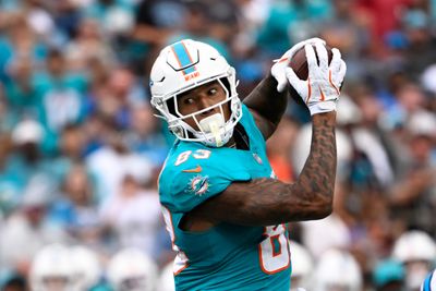 Oct 5, 2025; Charlotte, North Carolina, USA; Miami Dolphins tight end Darren Waller (83) catches the ball in the first quarter at Bank of America Stadium. Mandatory Credit: Bob Donnan-Imagn Images
