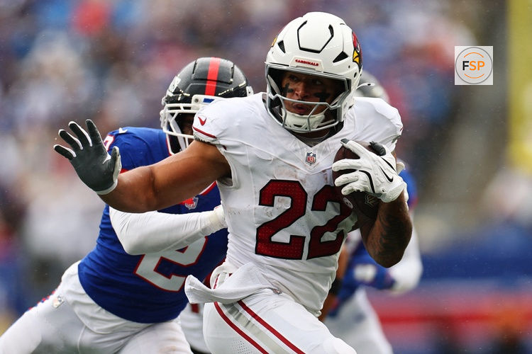 Oct 4, 2026; East Rutherford, New Jersey, USA;  Arizona Cardinals running back Tyler Allgeier (22) rushes the ball during the first quarter at MetLife Stadium.  Credit: Vincent Carchietta-Imagn Images
