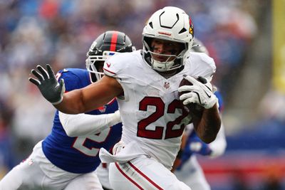 Oct 4, 2026; East Rutherford, New Jersey, USA;  Arizona Cardinals running back Tyler Allgeier (22) rushes the ball during the first quarter at MetLife Stadium.  Mandatory Credit: Vincent Carchietta-Imagn Images