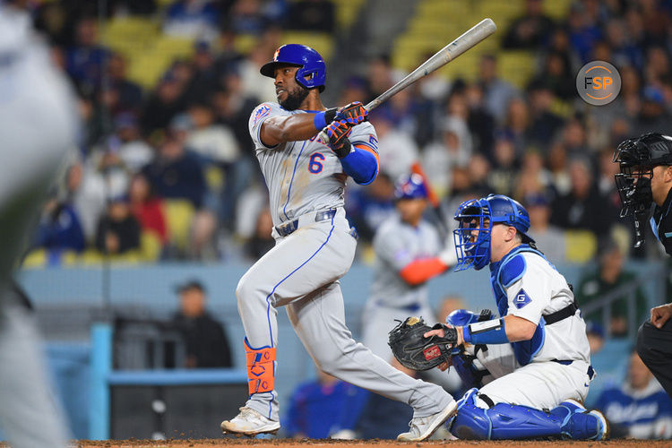 LOS ANGELES, CA - APRIL 19: New York Mets right fielder Starling Marte (6) drives in a run during the MLB game between the New York Mets and the Los Angeles Dodgers on April 19, 2024 at Dodger Stadium in Los Angeles, CA. (Photo by Brian Rothmuller/Icon Sportswire)