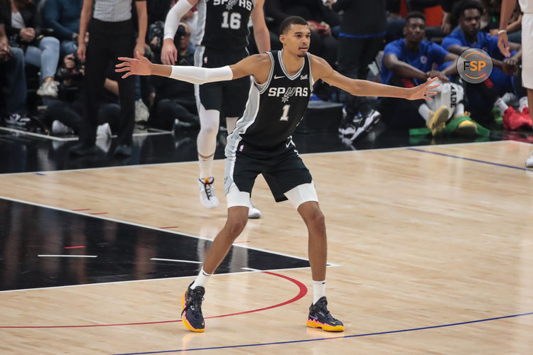 LOS ANGELES, CA - OCTOBER 29: San Antonio Spurs center Victor Wembanyama (1) shows his wingspan during the San Antonio Spurs game versus the Los Angeles Clippers on October 29, 2023, at Crypto.com Arena in Los Angeles, CA. (Photo by Jevone Moore/Icon Sportswire)