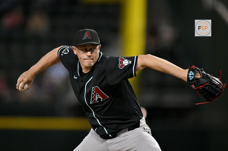 May 13, 2026; Arlington, Texas, USA;  Arizona Diamondbacks relief pitcher Paul Sewald (38) pitches against the Texas Rangers during the ninth inning at Globe Life Field. Credit: Jerome Miron-Imagn Images
