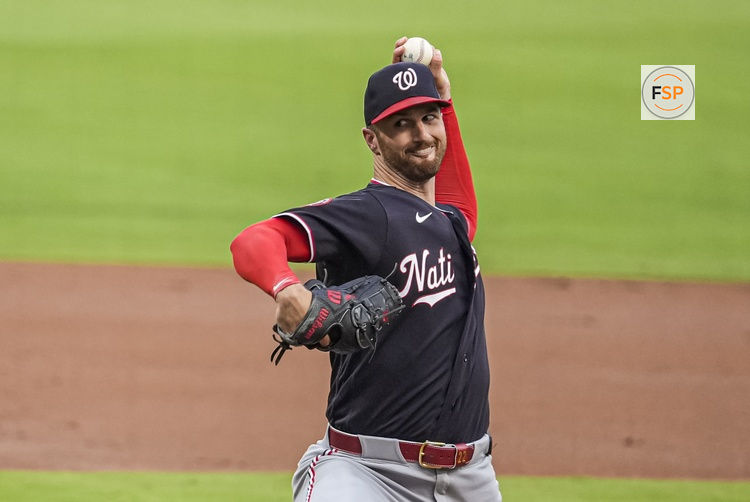 Jul 31, 2026; Cumberland, Georgia, USA; Washington Nationals pitcher Foster Griffin (22) pitches against the Atlanta Braves during the first inning at Truist Park. Credit: Dale Zanine-Imagn Images