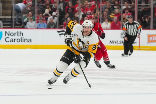 Mar 18, 2026; Raleigh, North Carolina, USA;  Pittsburgh Penguins center Sidney Crosby (87) skates with the puck against the Carolina Hurricanes during the second period at Lenovo Center. Mandatory Credit: James Guillory-Imagn Images