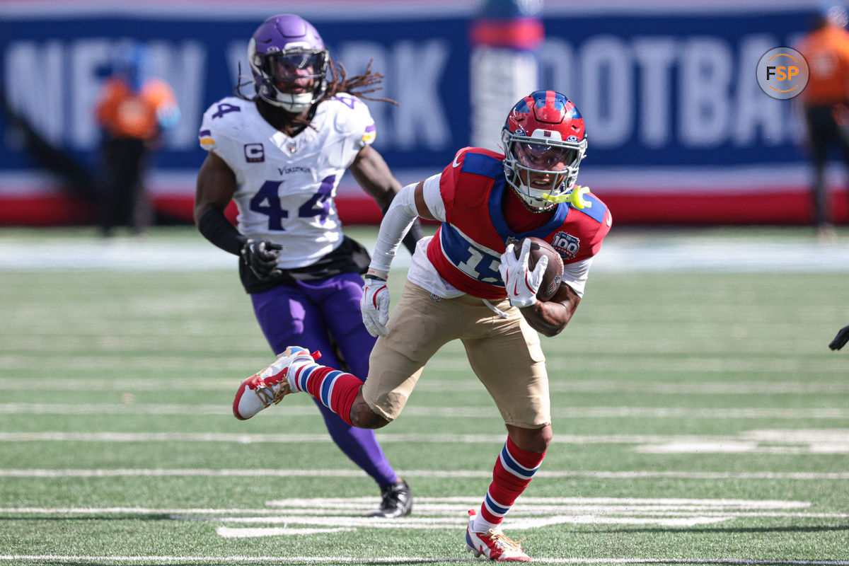 Sep 8, 2024; East Rutherford, New Jersey, USA; New York Giants wide receiver Wan'Dale Robinson (17) gains yards after catch in front of Minnesota Vikings safety Josh Metellus (44) during the second half at MetLife Stadium. Credit: Vincent Carchietta-Imagn Images