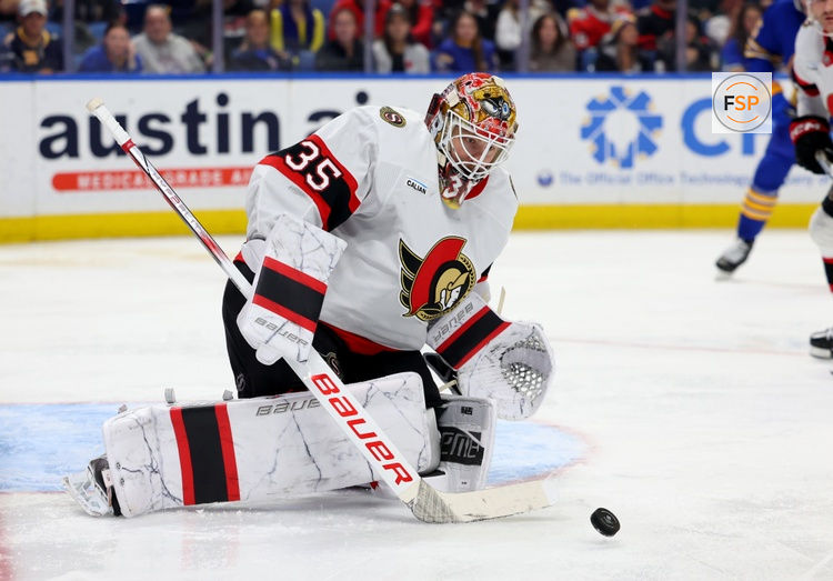 Nov 5, 2024; Buffalo, New York, USA;  Ottawa Senators goaltender Linus Ullmark (35) looks to make a save during the second period against the Buffalo Sabres at KeyBank Center. Credit: Timothy T. Ludwig-Imagn Images