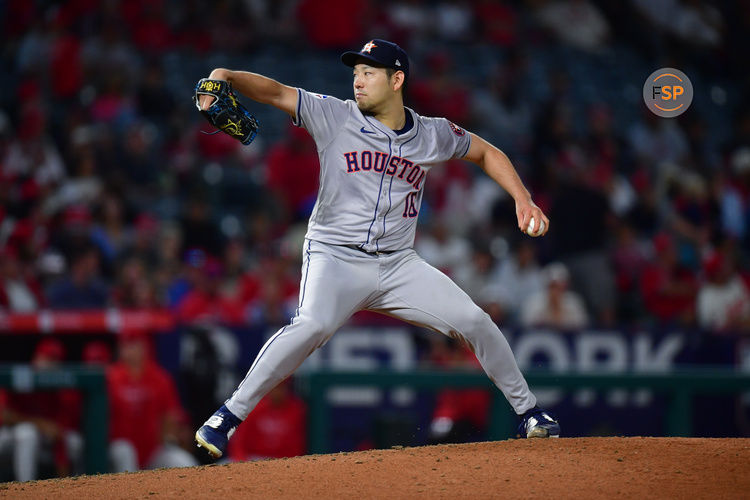 Sep 13, 2024; Anaheim, California, USA; Houston Astros pitcher Yusei Kikuchi (16) throws against the Los Angeles Angels during the third inning at Angel Stadium. Credit: Gary A. Vasquez-Imagn Images