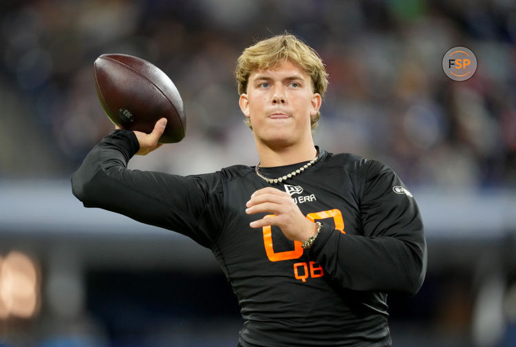 Mar 1, 2025; Indianapolis, IN, USA; Mississippi quarterback Jaxson Dart (QB03) during the 2025 NFL Combine at Lucas Oil Stadium. Credit: Kirby Lee-Imagn Images
