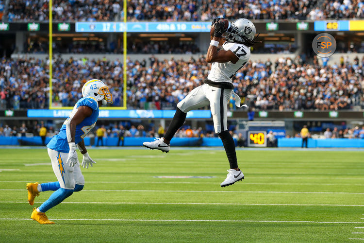 INGLEWOOD, CA - OCTOBER 1: Las Vegas Raiders wide receiver Davante Adams (17) catches the ball for a gain during the NFL regular season game between the Las Vegas Raiders and the Los Angeles Chargers on October 1, 2023, at SoFi Stadium in Inglewood, CA. (Photo by Jordon Kelly/Icon Sportswire)