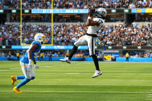 INGLEWOOD, CA - OCTOBER 1: Las Vegas Raiders wide receiver Davante Adams (17) catches the ball for a gain during the NFL regular season game between the Las Vegas Raiders and the Los Angeles Chargers on October 1, 2023, at SoFi Stadium in Inglewood, CA. (Photo by Jordon Kelly/Icon Sportswire)