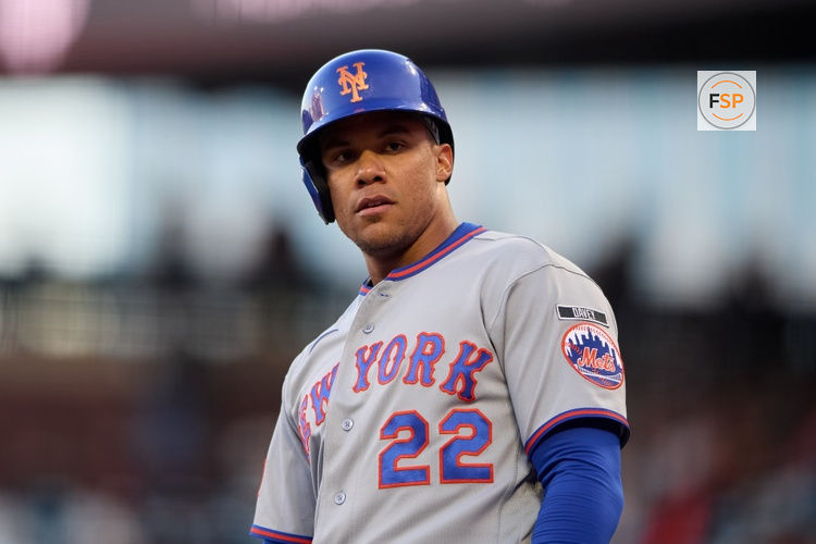 Apr 2, 2026; San Francisco, California, USA; New York Mets outfielder Juan Soto (22) reacts after scoring a run on an RBI double hit by infielder Bo Bichette (19) against the San Francisco Giants during the first inning at Oracle Park. Credit: Robert Edwards-Imagn Images