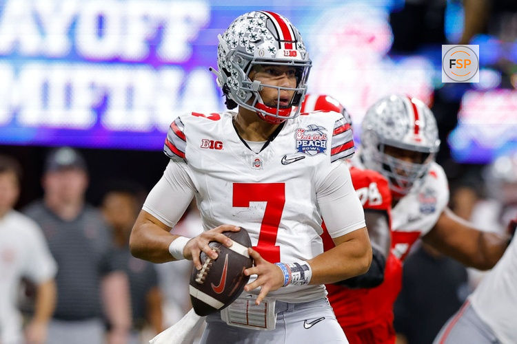 ATLANTA, GA - DECEMBER 31: C.J. Stroud #7 of the Ohio State Buckeyes drops back to pass during the first half against the Georgia Bulldogs in the Chick-fil-A Peach Bowl at Mercedes-Benz Stadium on December 31, 2022 in Atlanta, Georgia. (Photo by Todd Kirkland/Getty Images) *** Local Caption *** C.J. Stroud 