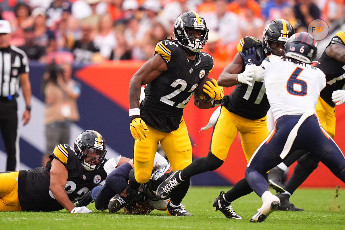 Sep 15, 2024; Denver, Colorado, USA; Pittsburgh Steelers running back Najee Harris (22) carries the ball in the second half against the Denver Broncos at Empower Field at Mile High. Credit: Ron Chenoy-Imagn Images