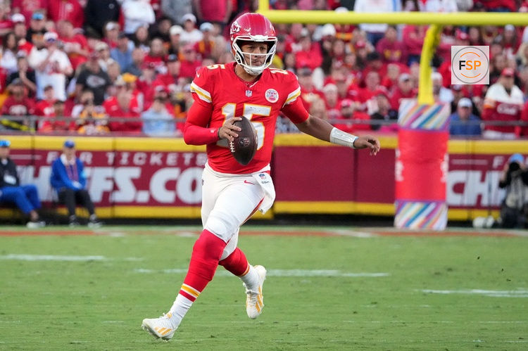 Oct 18, 2026; Kansas City, Missouri, USA;  Kansas City Chiefs quarterback Patrick Mahomes (15) scrambles during the fourth quarter against the Los Angeles Chargers at GEHA Field at Arrowhead Stadium.  Credit: Denny Medley-Imagn Images