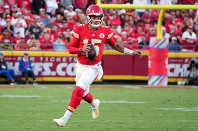 Oct 18, 2026; Kansas City, Missouri, USA;  Kansas City Chiefs quarterback Patrick Mahomes (15) scrambles during the fourth quarter against the Los Angeles Chargers at GEHA Field at Arrowhead Stadium.  Mandatory Credit: Denny Medley-Imagn Images