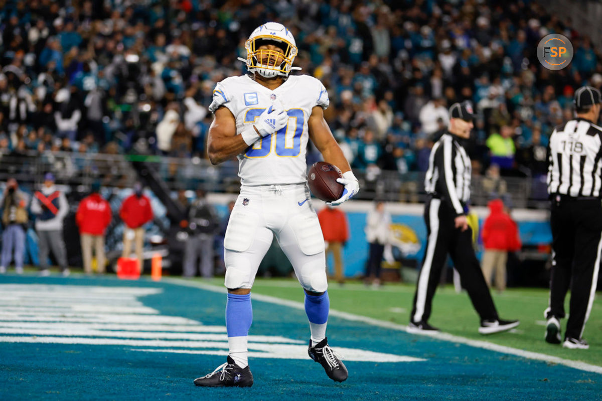 JACKSONVILLE, FL - JANUARY 14: Los Angeles Chargers running back Austin Ekeler (30) reacts after scoring a touchdown during the game between the Los Angeles Chargers and the Jacksonville Jaguars on January 14, 2023 at TIAA Bank Field in Jacksonville, Fl. (Photo by David Rosenblum/Icon Sportswire)