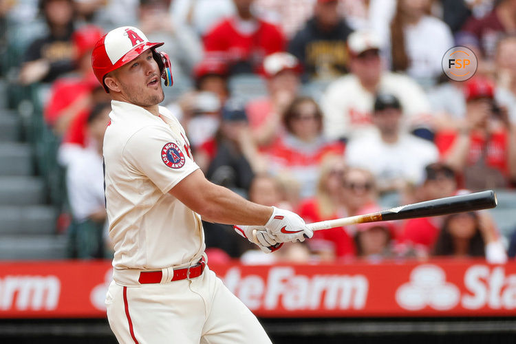 ANAHEIM, CA - JUNE 11: Los Angeles Angels center fielder Mike Trout (27) hits a single during a regular season game between the Los Angeles Angels and Seattle Mariners on June 11, 2023 at Angel Stadium in Anaheim, CA. (Photo by Brandon Sloter/Icon Sportswire)