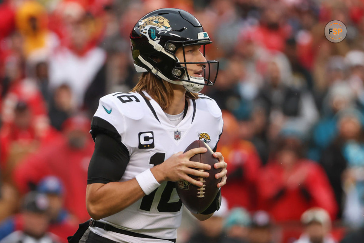 KANSAS CITY, MO - JANUARY 21: Jacksonville Jaguars quarterback Trevor Lawrence (16) looks to pass in the first quarter of an AFC divisional playoff game between the Jacksonville Jaguars and Kansas City Chiefs on January 21, 2023 at GEHA Field at Arrowhead Stadium in Kansas City, MO. (Photo by Scott Winters/Icon Sportswire)