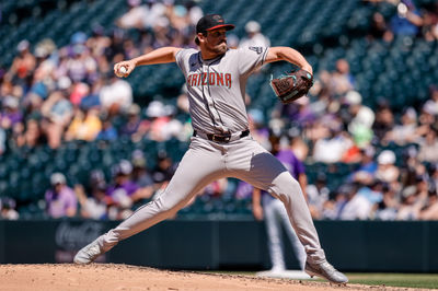 Jun 22, 2025; Denver, Colorado, USA; Arizona Diamondbacks pitcher Kevin Ginkel (37) pitches in the sixth inning against the Colorado Rockies at Coors Field. Mandatory Credit: Isaiah J. Downing-Imagn Images