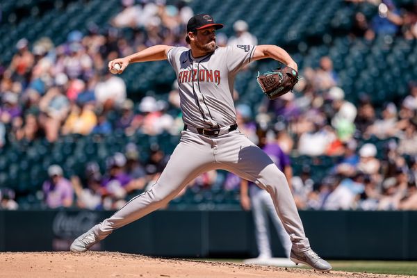 Jun 22, 2025; Denver, Colorado, USA; Arizona Diamondbacks pitcher Kevin Ginkel (37) pitches in the sixth inning against the Colorado Rockies at Coors Field. Mandatory Credit: Isaiah J. Downing-Imagn Images