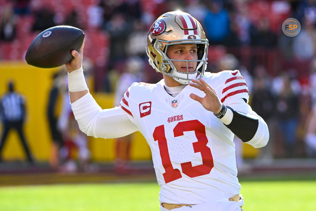 Dec 31, 2023; Landover, Maryland, USA; San Francisco 49ers quarterback Brock Purdy (13) warms up  before the game against the Washington Commanders at FedExField. Credit: Brad Mills-USA TODAY Sports