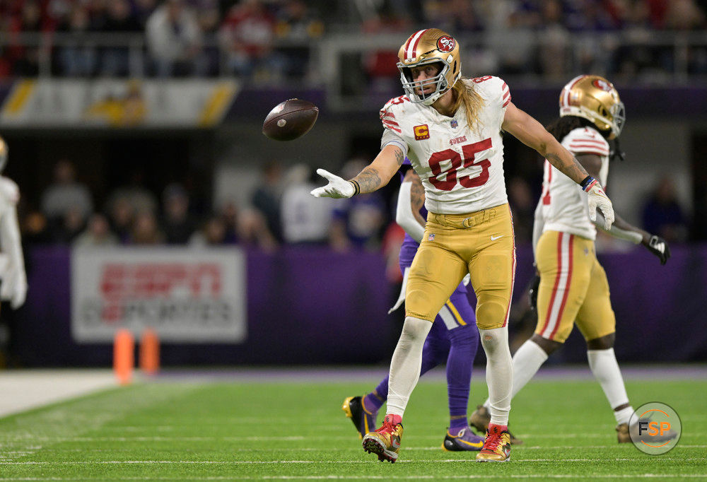 MINNEAPOLIS, MN - OCTOBER 23: San Francisco 49ers tight end George Kittle (85) flips the ball to a ref during an NFL game between the Minnesota Vikings and San Francisco 49ers on October 23, 2023, at U.S. Bank Stadium in Minneapolis, MN.(Photo by Nick Wosika/Icon Sportswire)
