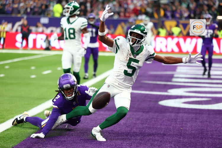 Oct 6, 2024; Tottenham, ENG; New York Jets wide receiver Garrett Wilson (5) appeals for pass interference from Minnesota Vikings Defensive Back Stephon Gilmore (2) in the 4th Quarter at Tottenham Hotspur Stadium. Credit: Shaun Brooks-Imagn Images