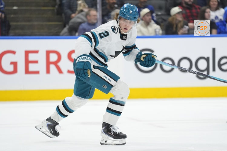 Dec 11, 2025; Toronto, Ontario, CAN; San Jose Sharks forward Will Smith (2) heads up ice against the Toronto Maple Leafs during overtime at Scotiabank Arena. Credit: John E. Sokolowski-Imagn Images