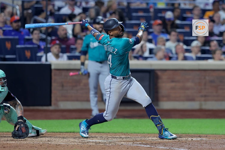 Aug 15, 2025; New York City, New York, USA; Seattle Mariners center fielder Julio Rodriguez (44) follows through on an RBI double against the New York Mets during the eighth inning at Citi Field. Credit: Brad Penner-Imagn Images