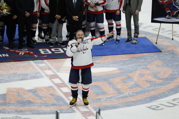 Apr 6, 2025; Elmont, New York, USA;  Washington Capitals left wing Alex Ovechkin (8) speaks after scoring in the during the second period during the game against the New York Islanders at UBS Arena. Ovechkin scored the 895th goal of his career, breaking the NHL all-time career goals record previously held by Wayne Gretzky at UBS Arena. Mandatory Credit: Geoff Burke-Imagn Images