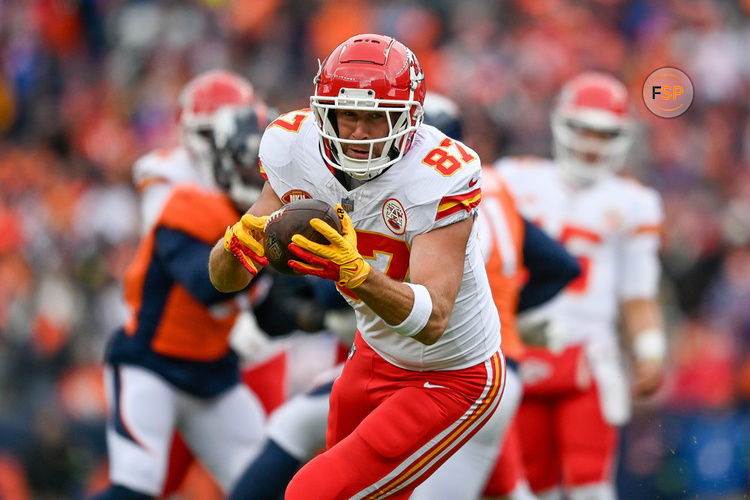 DENVER, CO - OCTOBER 29: Kansas City Chiefs tight end Travis Kelce (87) runs after a catch in the first half during a game between the Kansas City Chiefs and the Denver Broncos at Empower Field at Mile High on October 29, 2023 in Denver, Colorado. (Photo by Dustin Bradford/Icon Sportswire)