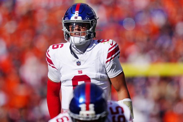 Oct 19, 2025; Denver, Colorado, USA; New York Giants quarterback Jaxson Dart (6) reacts after a play during the first half against the Denver Broncos at Empower Field at Mile High. Mandatory Credit: Ron Chenoy-Imagn Images