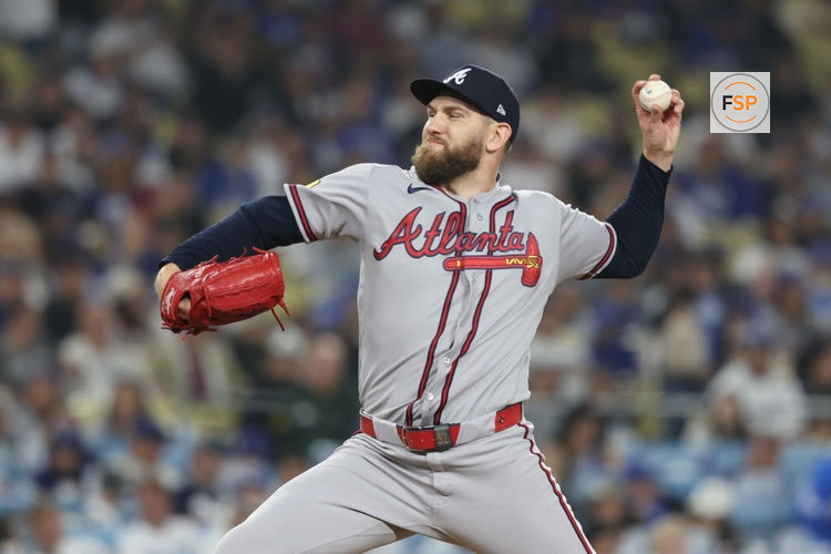 May 9, 2026; Los Angeles, California, USA;  Atlanta Braves pitcher Dylan Lee (52) throws to the plate during the seventh inning against the Los Angeles Dodgers at Dodger Stadium. Credit: Kiyoshi Mio-Imagn Images