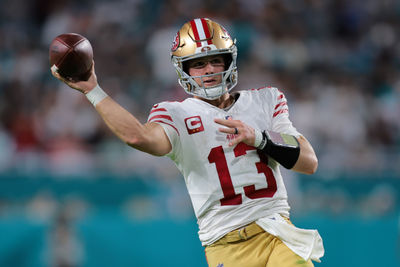 Dec 22, 2024; Miami Gardens, Florida, USA; San Francisco 49ers quarterback Brock Purdy (13) throws the football against the Miami Dolphins during the fourth quarter at Hard Rock Stadium. Mandatory Credit: Sam Navarro-Imagn Images