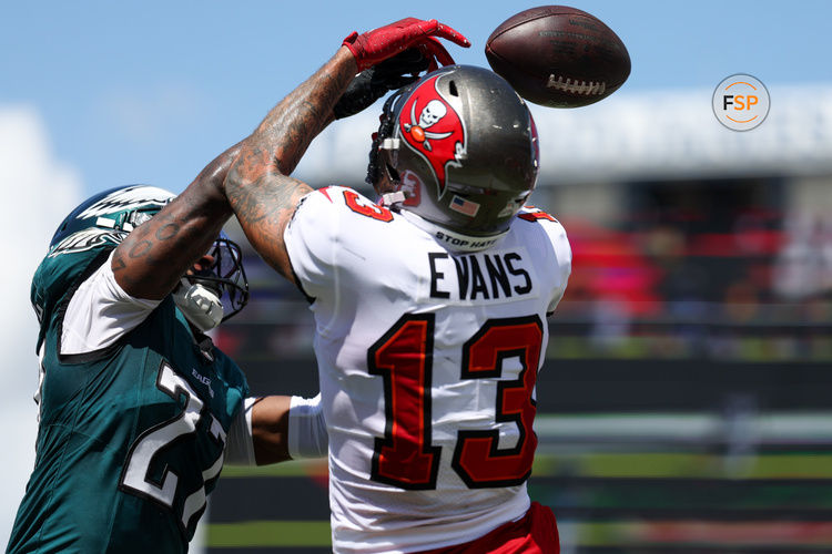 Sep 29, 2024; Tampa, Florida, USA; Philadelphia Eagles cornerback Quinyon Mitchell (27) breaks up a pass to Tampa Bay Buccaneers wide receiver Mike Evans (13) in the second quarter at Raymond James Stadium. Credit: Nathan Ray Seebeck-Imagn Images