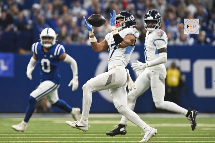 Oct 26, 2025; Indianapolis, Indiana, USA; Tennessee Titans wide receiver Chimere Dike (17) catches a pass during the second quarter against the Indianapolis Colts at Lucas Oil Stadium. Credit: Robert Goddin-Imagn Images