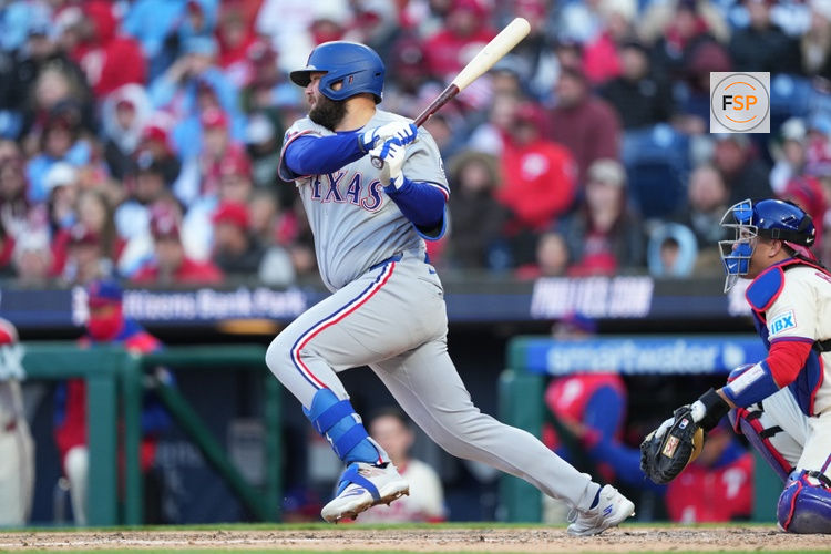 Mar 28, 2026; Philadelphia, Pennsylvania, USA; Texas Rangers infielder Jake Burger (21) hits a single against the Philadelphia Phillies in the eighth inning at Citizens Bank Park. Credit: Kyle Ross-Imagn Images