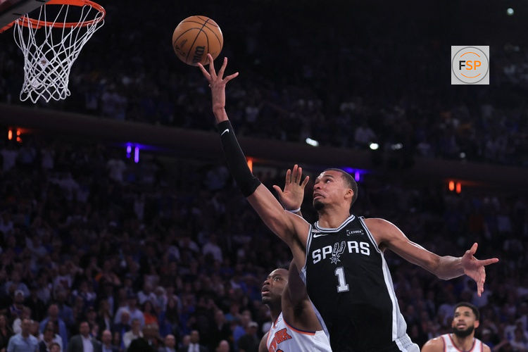 Jun 10, 2026; New York, New York, USA; San Antonio Spurs forward Victor Wembanyama (1) shoots against New York Knicks forward Og Anunoby (8) in the fourth quarter during game four of the 2026 NBA Finals at Madison Square Garden. Credit: Brad Penner-Imagn Images
