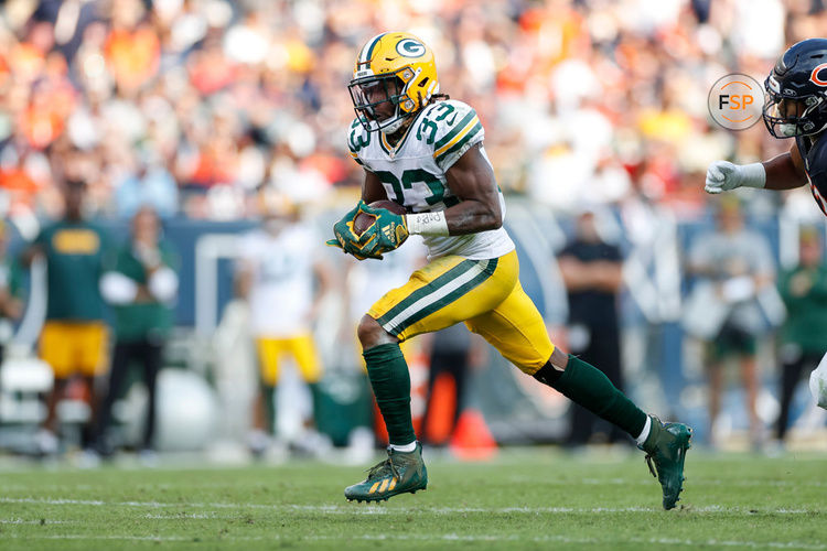 CHICAGO, IL - SEPTEMBER 10: Green Bay Packers running back Aaron Jones (33) carries the ball on a running play in the second half during a regular season game between the Green Bay Packers and the Chicago Bears on September, 10, 2023, at Soldier Field in Chicago, IL. (Photo by Brandon Sloter/Icon Sportswire)