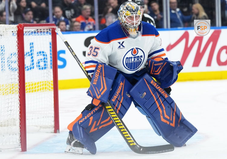 Dec 13, 2025; Toronto, Ontario, CAN; Edmonton Oilers goaltender Tristan Jarry (35) follows the play against the Toronto Maple Leafs during the third period at Scotiabank Arena. Credit: Nick Turchiaro-Imagn Images