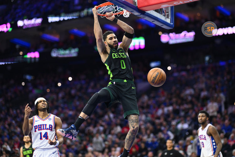 Feb 2, 2025; Philadelphia, Pennsylvania, USA; Boston Celtics forward Jayson Tatum (0) dunks against the Philadelphia 76ers in the second quarter at Wells Fargo Center. Credit: Kyle Ross-Imagn Images