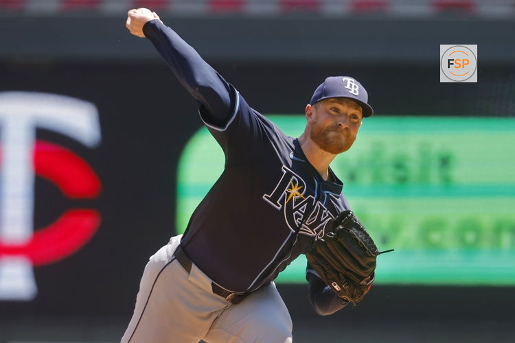 Jul 6, 2025; Minneapolis, Minnesota, USA; Tampa Bay Rays starting pitcher Drew Rasmussen (57) throws to the Minnesota Twins in the first inning at Target Field. Credit: Bruce Kluckhohn-Imagn Images