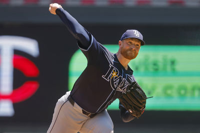 Jul 6, 2025; Minneapolis, Minnesota, USA; Tampa Bay Rays starting pitcher Drew Rasmussen (57) throws to the Minnesota Twins in the first inning at Target Field. Mandatory Credit: Bruce Kluckhohn-Imagn Images
